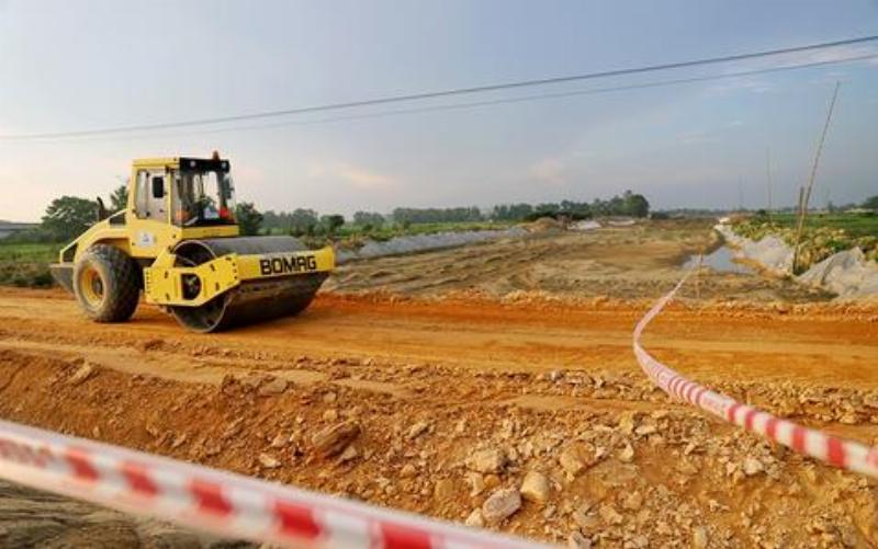 Biểu đồ hoặc công thức minh họa cách tính giá đền bù đất làm đường.
